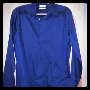 Brand new Calvin Klein Men’s Navy Blue Button up.